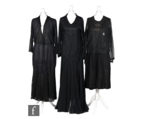 Three 1930s ladies vintage black dresses, the first in chiffon with inset lace panels to the bodice and sleeves with a deep l