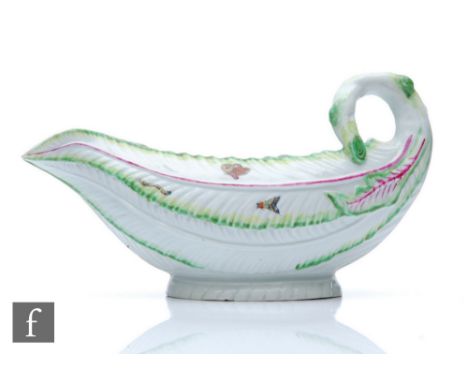 An 18th Century Worcester Cos Lettuce shape sauce boat, the moulded body sparsely decorated with hand painted insects and mou