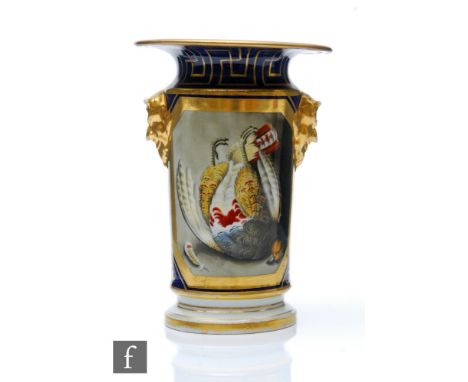 A 19th Century spill vase decorated with a hand painted dead partridge within a gilt border against a blue ground with a gilt