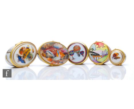 Five later 20th Century Royal Worcester pill boxes of varying form and decoration to include one with hot air balloons and on