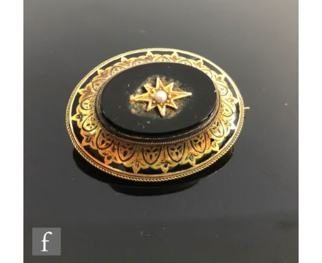 An early 20th Century 15ct oval memorial brooch set with central pearl to a part enamel decorated border, total weight 10.5g,