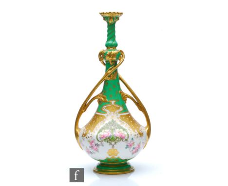 An early 20th Century Royal Crown Derby Art Nouveau vase decorated with stylised trees and pink flowers with gilt detailing a