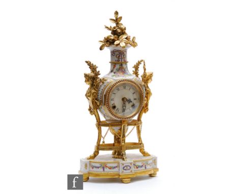 A contemporary Victoria and Albert Museum licensed reproduction Marie-Antoinette clock, the porcelain body with floral and gi