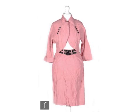 A 1950s/1960s ladies vintage two piece suit in a pink satin with a thin brown stripe, the bolero jacket with four black butto