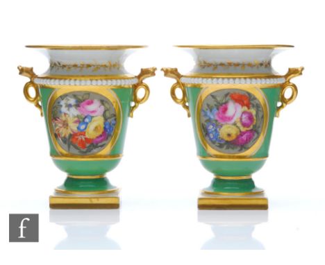 A pair of early 19th Century Flight Barr and Barr Worcester spill vases each decorated with a hand painted gilt framed floral