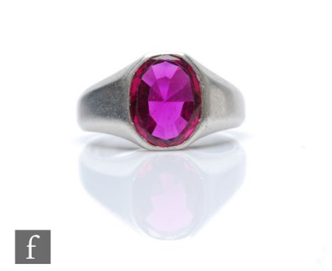 A platinum set single stone ruby ring, oval collar set stone, weight approximately 1.50ct, total weight 7g, later unmarked sh