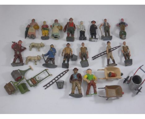 BRITAINS COLLECTION OF GARDEN WORKERS, WHEELBARROWS, ROLLERS, MILK BARROW, LAWN MOWER, TRAMP WITH DOG AND MAN WITH DOG, 2 LAD