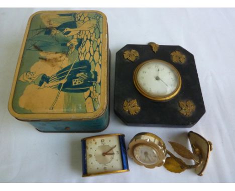MISC. CLOCKS INC. R.TIMS MORETON IN MARSH MOVEMENT CLOCK IN A MINIATURE FRAME, NOVELTY CLOCK IN A BISCUIT TIN AND A JAEGER 8 