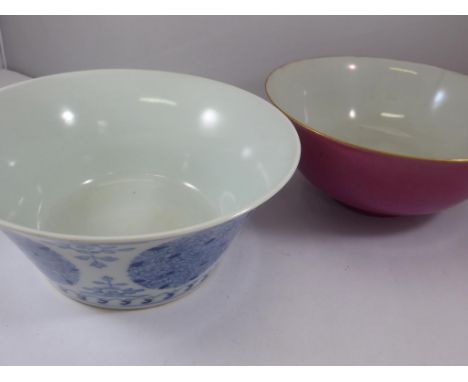 2 CHINESE PORCELAIN BOWLS WITH SQUARE SEAL MARKS TO BASE, EACH APPROX. 15 cm DIA. there is a hairline crack to the blue bow a