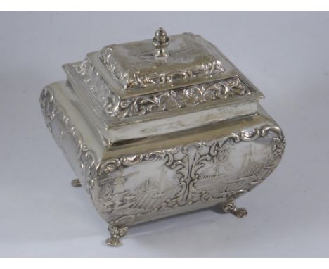 SILVER TEA CADDY, RECTANGULAR BOMBE SHAPED, WITH HINGED COVER, ACORN FINIAL AND EMBOSSED WINDMILL AND BOATS DECORATION, APPRO