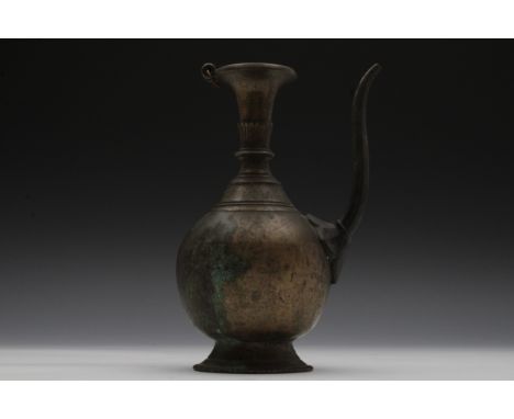 A Nepalese Brass Ewer with a Peacock Finial Possibly from the 18th-19th CenturyH: Approximately 24cmL: Approximately 8cm 