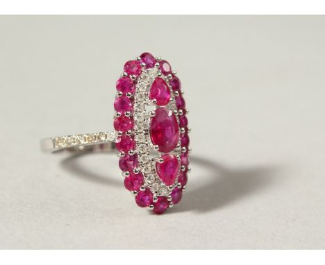 AN 18CT GOLD ART DECO DESIGN RUBY AND DIAMOND RING.