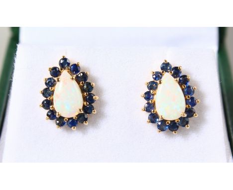 A PAIR OF 9CT GOLD, PEAR SHAPED OPAL AND SAPPHIRE EARRINGS.