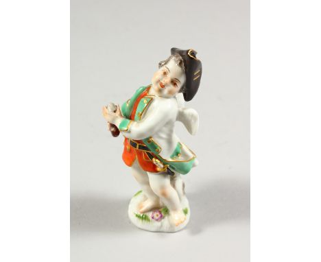 A SMALL MEISSEN FIGURE OF A CHERUB HOLDING A GUN, crossed swords mark to base. 3.5ins high.