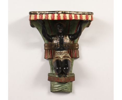 A BLACKAMOOR WALL BRACKET. 11.5ins high.