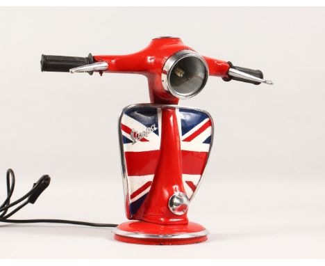 A NOVELTY TABLE LAMP, modelled as the front end of a moped. 13ins high.