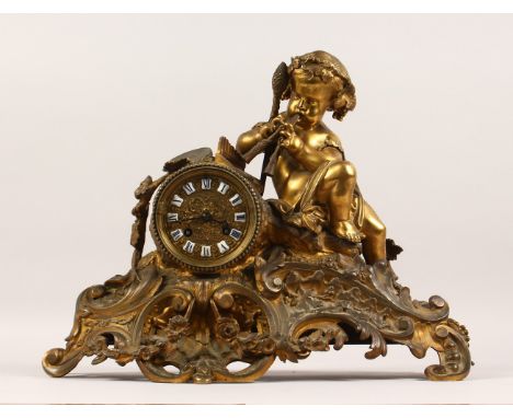 A 19TH CENTURY FRENCH ORMOLU MANTLE CLOCK, with eight-day movement striking on a bell, enamelled Roman numerals, the case wit