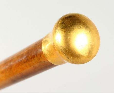 A CONTINENTAL GOLD TOP MALACCA WALKING STICK. 36ins long.