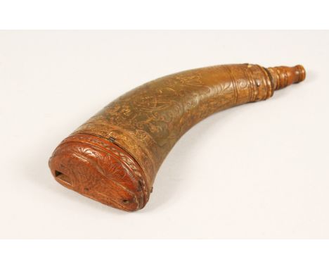 AN 18TH CENTURY/19TH CENTURY CARVED HORN POWDER FLASK, with carved wood base depicting a rabbit. 8ins long.