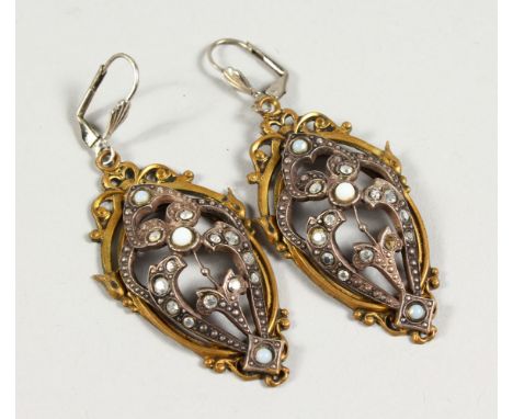 A PAIR OF GILT METAL CUT STEEL AND OPAL EARRINGS. 2ins high.