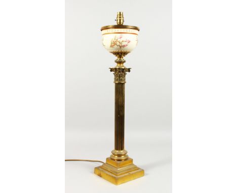 A GOOD BRASS CORINTHIAN COLUMN TABLE LAMP, possibly converted from an oil lamp, with Royal Worcester blush ivory porcelain re