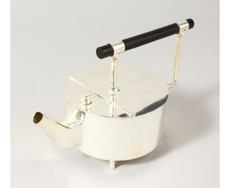 A CHRISTOPHER DRESSER STYLE CIRCULAR SHAPED TEAPOT.