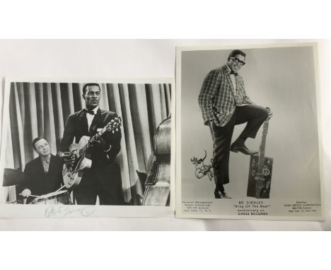 CHUCK BERRY & BO DIDDLEY - two 8"x10" signed black & white promotional photographs. The first of Chuck Berry signed in blue b