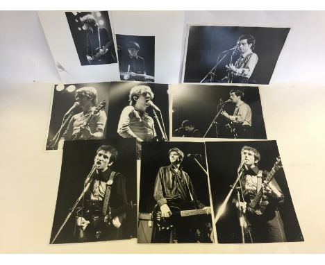 BUZZCOCKS - 9 original b/w vintage prints of the Buzzcocks, most with photographers stamps on verso. Photographers include Ba