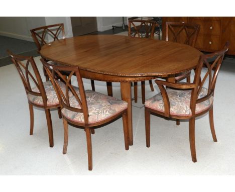 A 1930s Figured Walnut Nine Piece Dining Suite, labelled Gaylayde, Modern Decorative Furniture, comprising an extending oval 