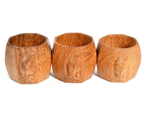 Mouseman: Three Robert Thompson English Oak Napkin Rings, of octagonal form, each with carved mouse signature, 5cm 