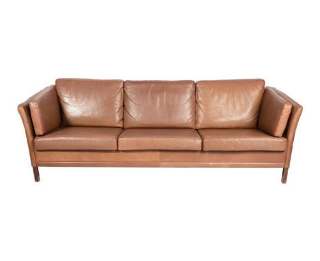 A 1960s Danish Tan Leather Three-Seater London-Type Sofa, on beech legs, 210cm by 70cm by 66cm