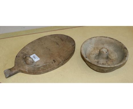 Mouseman: A Robert Thompson English Oak Nut Bowl, with central cracking piece, with carved mouse signature, 17cm diameter; an