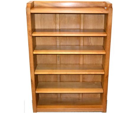 Mouseman: A Robert Thompson English Oak 4ft Open Bookcase, with raised upstand, solid ends and panelled back, four adjustable