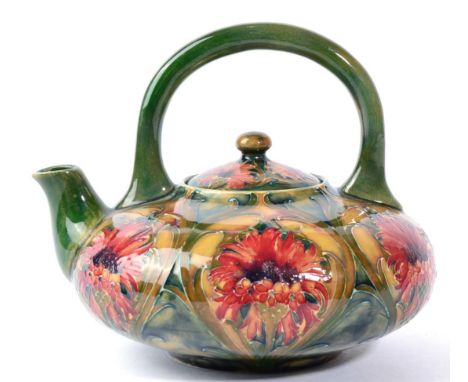 William Moorcroft (1872-1945): A Revived Cornflower or Brown Chrysanthemum Pattern Teapot, circa 1912-13, green painted signa