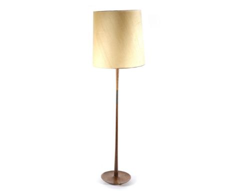 A 1960s Teak Combination Uplighter/Standard Lamp, with original shade enclosing a brass dome with two Eddison screw light fit