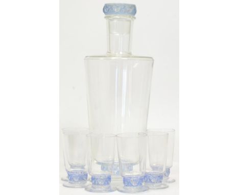 René Lalique (French, 1860-1945): A Clear and Blue Stained Glass Dampierre Carafe and Six Madeira Glasses, moulded in relief 
