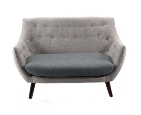 A Two-Seated Button Grey Sofa, modern, of curved form with contrasting grey cushion, on walnut effect splayed legs, 125cm by 