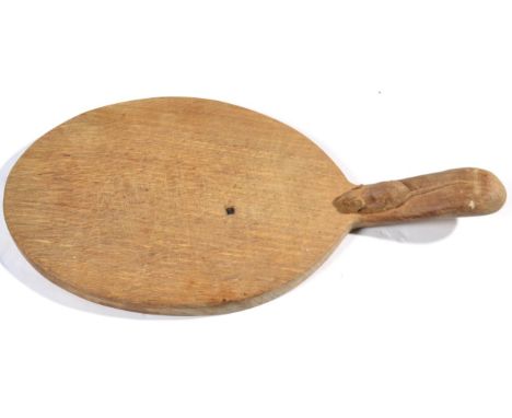 Mouseman: A Robert Thompson English Oak Cheese Board, with carved mouse signature on handle, 37cm