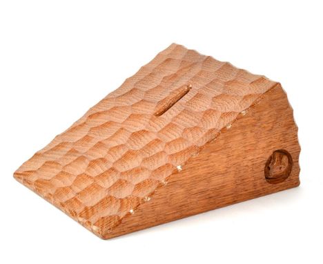 Mouseman: A Robert Thompson English Oak Money Box Wedge of Cheese, with carved mouse signature, 13.5cm by 17.5cm, 8.5cm