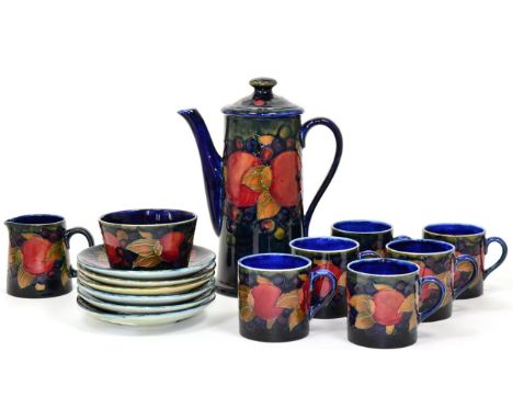 William Moorcroft (1872-1945): A Pomegranate Pattern Coffee Service, comprising coffee pot and cover, six cups, six saucers, 