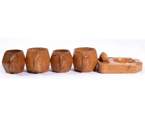 Mouseman: Four Robert Thompson English Oak Napkin Rings, of octagonal form, each with carved mouse signature, 5cm; and A Robe