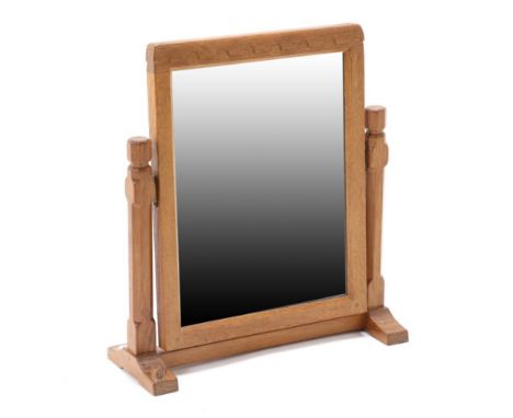 Mouseman: A Robert Thompson English Oak Stand Mirror, the rectangular mirror pivots between two octagonal supports on a low l