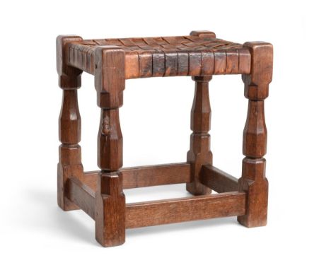 Mouseman: A Robert Thompson English Oak Stool, with lattice leather top, on four octagonal legs joined by stretchers, with ca