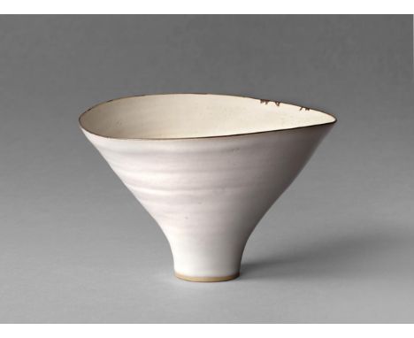 Dame Lucie Rie DBE (1902-1995): A Footed Bowl with Flaring Rim, stoneware with an all over oatmeal glaze and manganese rim, i