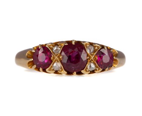 SYNTHETIC RUBY AND DIAMOND RING,set with three synthetic rubies interspaced by rose cut diamond chips, in eighteen carat gold