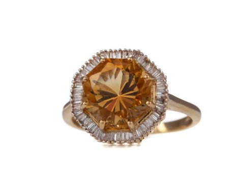 CITRINE AND DIAMOND RING,set with an octagonal citrine within a halo of baguette cut diamonds, marked 9K, size P, 3.6gConditi