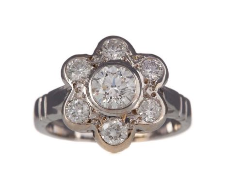 GIA CERTIFICATED DIAMOND DAISY CLUSTER RING,the GIA certificated centre stone of approximately 0.74 carats, GIA report number