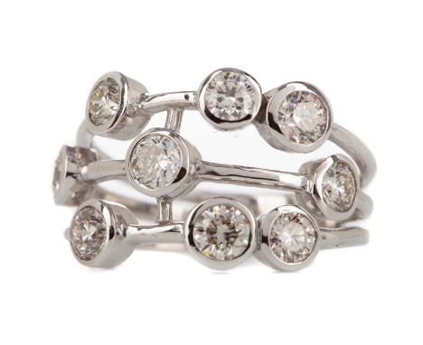 DIAMOND DRESS RING,the bezel set round brilliant cut diamonds totalling approximately 1.40 carats, marked 9K, size M 1/2, 4.5