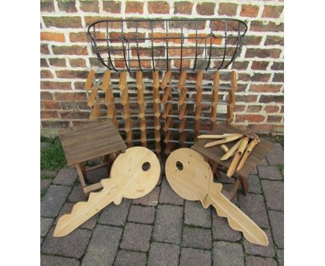 Collection of items including wine racks, small wooden fold up stool/tables, bamboo wind chime, metal hay rack/planter and 2 