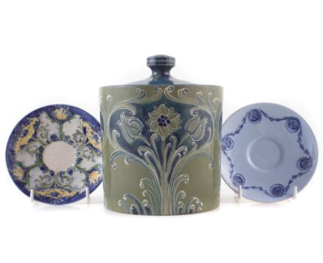 Macintyre Moorcroft biscuit barrel , decorated with a two tone green Florian design, also two saucers, (4) the barrel stands 